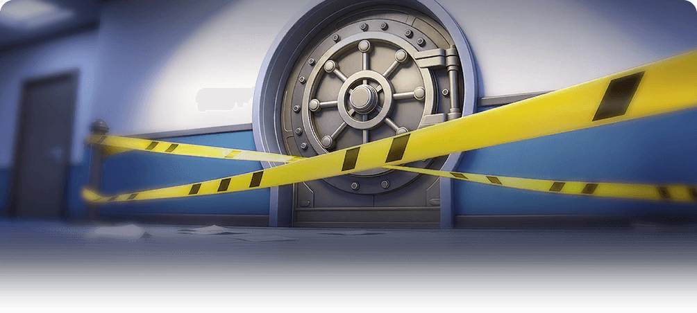 A bank vault door sealed off behind crossed police tape
